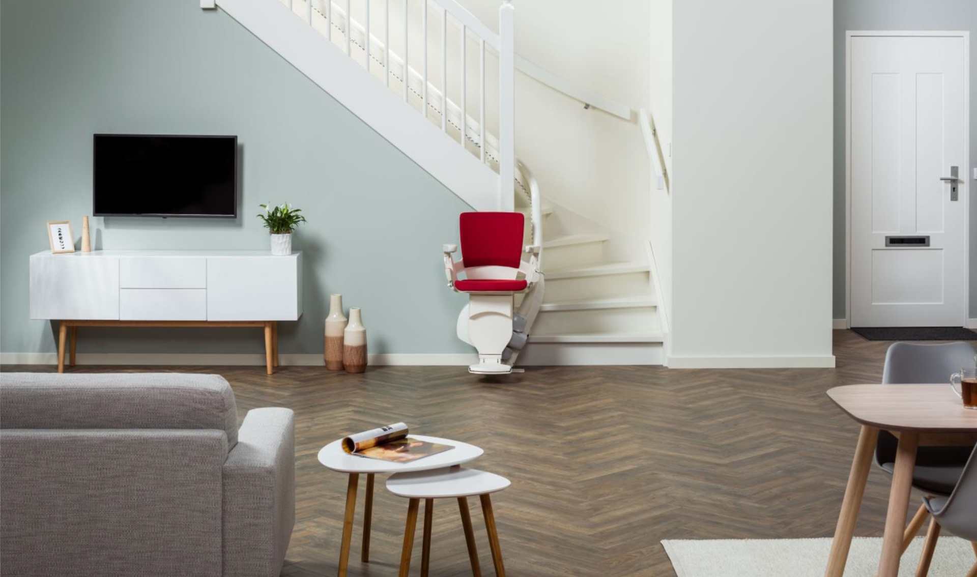 Slimline stairlift fitted to a narrow staircase in a Manchester home